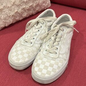 White checkerboard pattern Vans sneakers